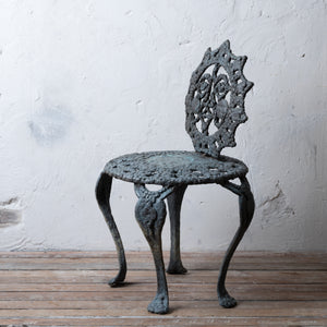 Sculpted Bronze Sun Face Chair
